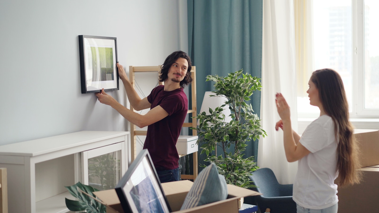 A couple settling into their new San Francisco home after a move